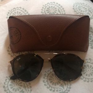 Like brand new ray bans. Worn only once.